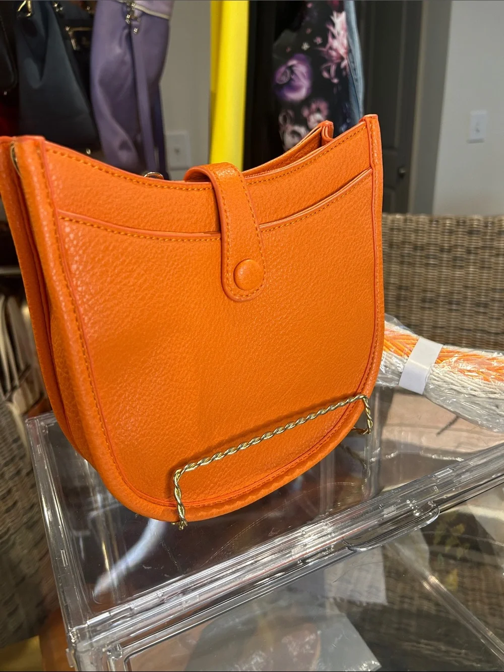 Calin Orange Pebbled Vegan Leather Crossbody with Guitar Strap 8”x 2.25”x 7” NWT